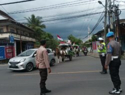 Polsek Batu Layar Turut Serta dalam Pengamanan Pawai Kirab Pemilu 2024 untuk Dukung Kelancaran dan Keamanan Acara