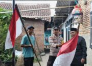 Bhabinkamtibmas Jadi Garda Terdepan, Ajak Warga Jagaraga Indah Kibarkan Merah Putih