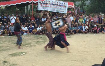 Merah Putih Berkibar, Meriahkan HUT RI dengan Tarung Peresean di Sekotim