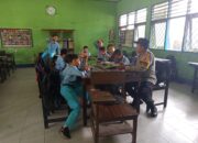 Polsek Gerung Kawal Pembagian Makanan Bergizi di Dua SD Dasan Tapen